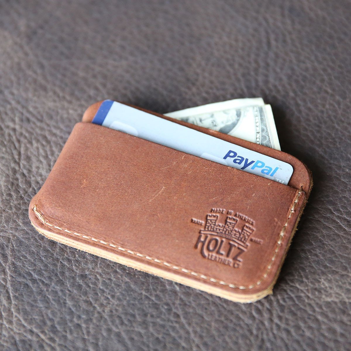 Fine leather triple sleeve front pocket wallet with Auburn logo and personalized initials
