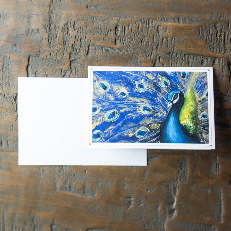 Stationery featuring drawing of a peacock drawn by Madison Holtz Butler
