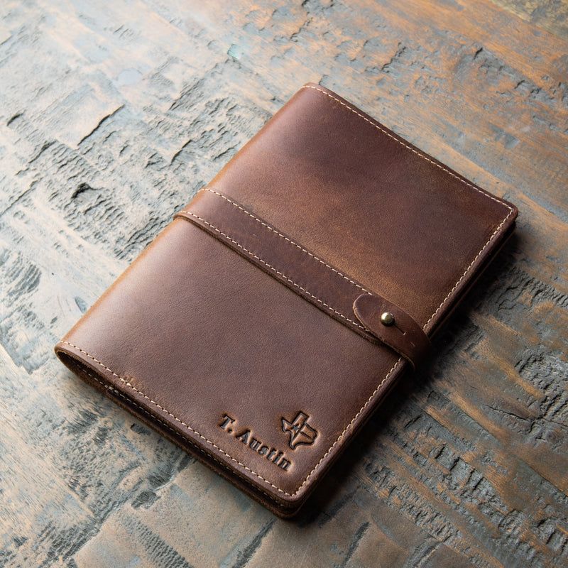 Leather journal cover with personalized name and outline of the state of Texas; from Holtz Leather Co in Huntsville, Alabama